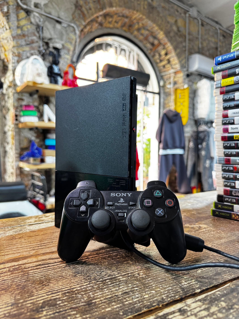 Console ps2 slim loose con pad e gioco omaggio random